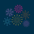 Fireworks bursting in glowing multi colours on dark blue background