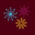 Fireworks bursting in glowing multi colours on dark red background