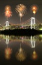 Fireworks celebrating over Tokyo Rainbow Bridge at Night Royalty Free Stock Photo