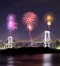 Fireworks celebrating over Tokyo Rainbow Bridge at Night Royalty Free Stock Photo