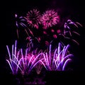 Fireworks display against a dark sky background. Royalty Free Stock Photo