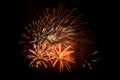 Fireworks display against a dark sky background. Royalty Free Stock Photo