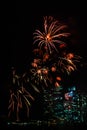 Fireworks display against a dark sky background. Royalty Free Stock Photo