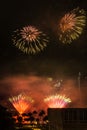 Fireworks display against a dark sky background. Royalty Free Stock Photo