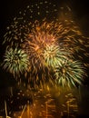 Fireworks display against a dark sky background. Royalty Free Stock Photo