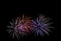 Fireworks display against a dark sky background. Royalty Free Stock Photo