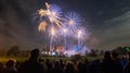 People watching Fireworks display at bonfire 4th of November celebration, Kenilworth Castle, united kingdom. Royalty Free Stock Photo