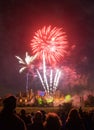 People watching Fireworks display at bonfire 4th of November celebration, Kenilworth Castle, united kingdom. Royalty Free Stock Photo