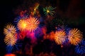 Fireworks display on dark sky background. Royalty Free Stock Photo