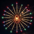 A fireworks display forms a spider and web design against the night sky. The spider is Royalty Free Stock Photo