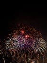 Fireworks display against a dark sky background. Royalty Free Stock Photo