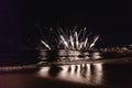 Fireworks display, night show on seafront, pyrotechnic festival. Antibes Juan les Pins Royalty Free Stock Photo