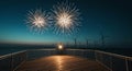 Fireworks Display Over Ocean and Wind Turbines at Dusk Royalty Free Stock Photo
