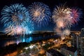 Fireworks Display Over River and City at Night Royalty Free Stock Photo