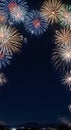 Colorful Fireworks Border on Night Sky with Copy Space Royalty Free Stock Photo
