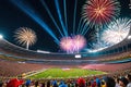 Fireworks Erupting in the Night Sky Above a Stadium Filled with Excited Spectators: Bursts of Color Illuminate the Celebration Royalty Free Stock Photo