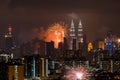 Fireworks explode near Malaysia`s landmark Petronas Twin Towers