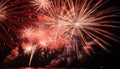 Fireworks explode in vibrant colors, illuminating the dark night sky generated by AI Royalty Free Stock Photo
