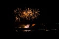 Fireworks exploding above the bridge during the 4th of July Royalty Free Stock Photo