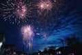 fireworks exploding against black night sky on new years eve Royalty Free Stock Photo