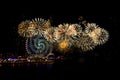 Fireworks in front of the Dubai Wheel overlooking the Persian Gulf on New Year's Eve