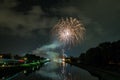 Fireworks of the Herbstdult with Ferris wheel and cathedral in Regensburg, Germany Royalty Free Stock Photo