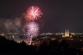 Fireworks of the Herbstdult with Ferris wheel and cathedral in Regensburg, Germany Royalty Free Stock Photo