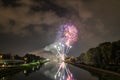 Fireworks of the Herbstdult with Ferris wheel and cathedral in Regensburg, Germany Royalty Free Stock Photo