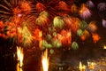 Fireworks lit up in the New Year`s festival are scattered across the sky at midnight in a variety of colors in the middle of the