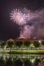 Fireworks at Night over the castle with boats in the river