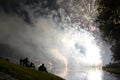 Fireworks in the olympic park in munich. Spectators watching fireworks at the olympic lake