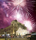 Fireworks over the Christmas and New Year holidays illumination and Four Seasons Hotel Moscow at night. Russia, Royalty Free Stock Photo