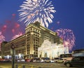 Fireworks over the Christmas and New Year holidays illumination and Four Seasons Hotel Moscow at night. Russia, Royalty Free Stock Photo