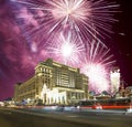 Fireworks over the Christmas and New Year holidays illumination and Four Seasons Hotel at night. Moscow. Russia. Royalty Free Stock Photo
