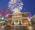 Fireworks over the Christmas and New Year holidays illumination in Moscow city center and Government building on Tverskaya street Royalty Free Stock Photo