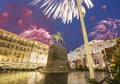 Fireworks over the Christmas and New Year holidays illumination. Yury Dolgoruky Monument, Russia Royalty Free Stock Photo