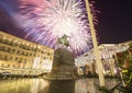 Fireworks over the Christmas and New Year holidays illumination. Yury Dolgoruky Monument, Russia Royalty Free Stock Photo