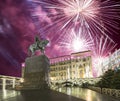 Fireworks over the Christmas and New Year holidays illumination. Yury Dolgoruky Monument, Russia Royalty Free Stock Photo