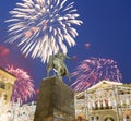 Fireworks over the Christmas and New Year holidays illumination. Yury Dolgoruky Monument, Russia Royalty Free Stock Photo