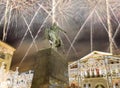 Fireworks over the Christmas and New Year holidays illumination. Yury Dolgoruky Monument, Russia Royalty Free Stock Photo