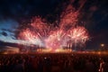 Fireworks over a festival crowd capturing the