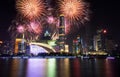 Fireworks over Guangzhou city modern buildings China