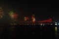 Fireworks over Istanbul Bosphorus during Turkish Republic Day celebrations. Bosphorus Bridge with red lighting and lasers at night Royalty Free Stock Photo