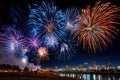 Fireworks over river and city skyline at night Royalty Free Stock Photo