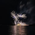 Fireworks over the river. Royalty Free Stock Photo