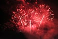 Fireworks. Salute. Sky background Amazing extravaganza of red sparkling lights in the night sky during the New Year and Christmas Royalty Free Stock Photo
