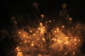 Fireworks. Salute. Sky background Fantastic garland of orange sparkling lights in the night sky during the New Year and Christmas Royalty Free Stock Photo