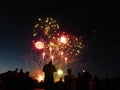 Fireworks with Silhouettes of watchers Royalty Free Stock Photo