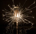 Fireworks sparkler showing through LED light bulb