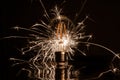 Fireworks sparkler showing through LED light bulb Royalty Free Stock Photo